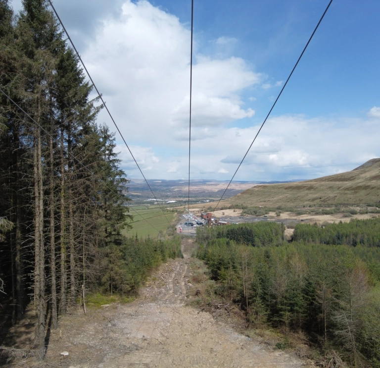 zip lines over the countryside.