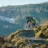2 people riding on a mountain bike trail at Penmachno